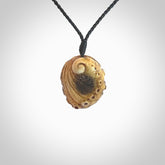 Hand carved deer antler Paua Shell Pendant. Made from Red Deer antler in New Zealand. Unique Pāua Shell necklace hand made from deer antler by master bone carver Fumio Noguchi. Spectacular collectable work of art, made to wear. One only pendant, delivered to you with express courier.